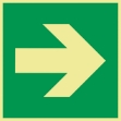 Skilt: Nødutgang, retningspil.  Etterlysende/selvlysende nødskilt med med pil. Brukes ofte i kombinasjon med andre nødskilt for å angi retning, f.eks. til nødutgang. Skiltet kan snus alle veier slik at pilen peker i ønsket retning. 