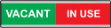 Bilde av VACANT / IN USE. Ledig/opptatt skilt med engelsk tekst
