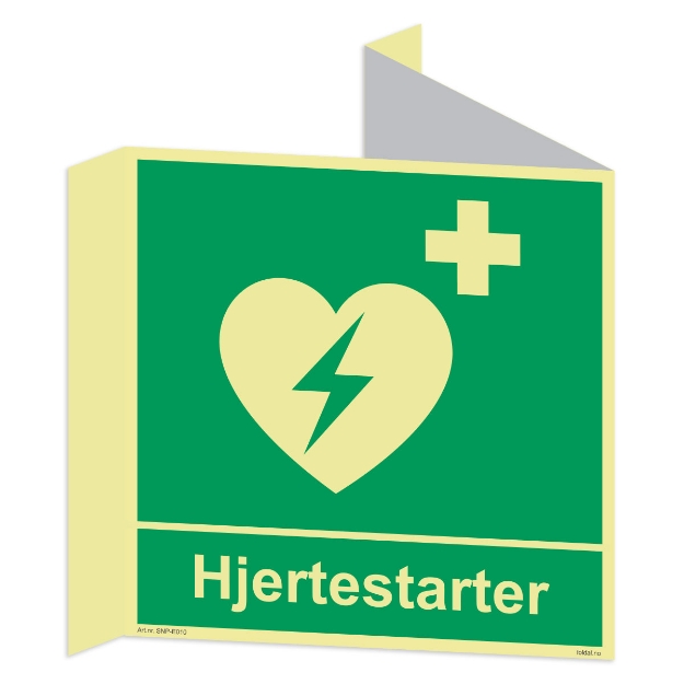 Hjertestarter skilt. Etterlysende plogskilt som står ut fra vegg og er synlig fra begge retninger.